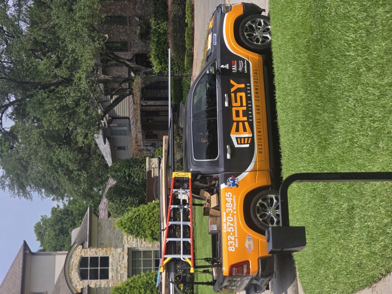 Easy Garage Door technician working on a residential job