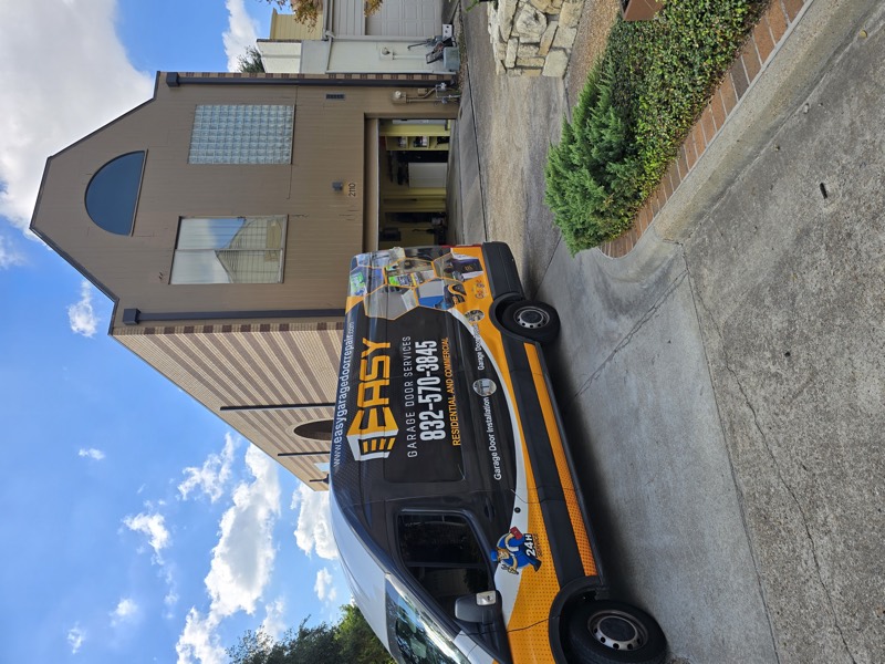 Branded EASY service van on a Houston driveway