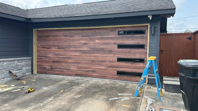 Finished wood-grain garage door installation
